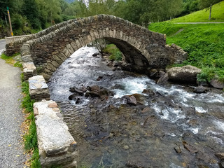 Roman-style bridge that crosses the Valira of Orient river, Llorts, Andorra