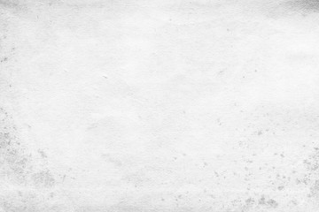 Cardboard white texture close-up. Light old paper background. Grunge concrete wall. Vintage blank wallpaper.