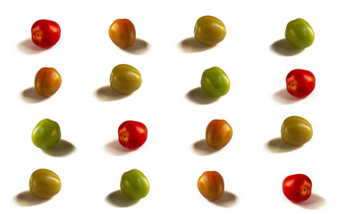 ripe cherry tomatos on  a white background