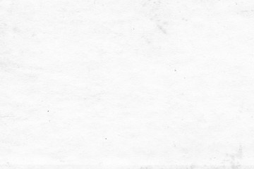 Cardboard white texture close-up. Light old paper background. Grunge concrete wall. Vintage blank wallpaper.