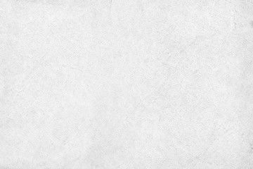 Obraz premium Cardboard white texture close-up. Light old paper background. Grunge concrete wall. Vintage blank wallpaper.