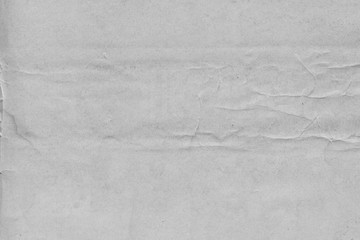 Cardboard white texture close-up. Light old paper background. Grunge concrete wall. Vintage blank wallpaper.