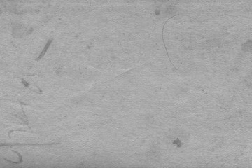 Cardboard white texture close-up. Light old paper background. Grunge concrete wall. Vintage blank wallpaper.