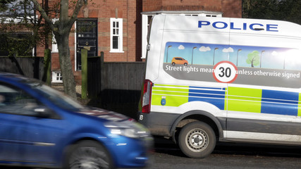 anpr camera van on british town road with traffic passing in england uk
