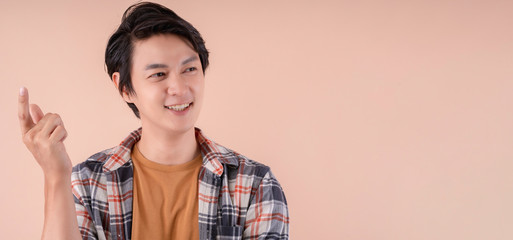 handsome asian attractive male face close up casual dress laugh and big smile happiness surprise expression,pretty asian man toothy smile wide mouth color background