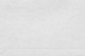 Fototapeta premium Cardboard white texture close-up. Light old paper background. Grunge concrete wall. Vintage blank wallpaper.