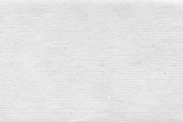 Cardboard white texture close-up. Light old paper background. Grunge concrete wall. Vintage blank wallpaper.