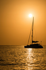 Seascape, silhouette of a yacht