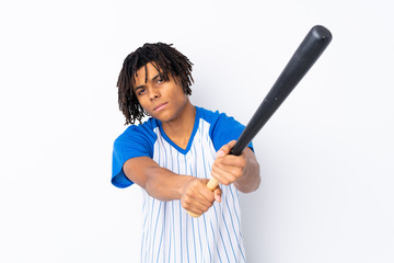 Young African American man playing baseball over isolated white background playing baseball