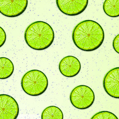 Flat layout green lime slices for summer seasonal concept. Ripe sliced lime on white background.
