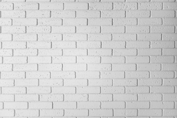 Obraz premium White brick wall background. Horizontal white textured wallpaper
