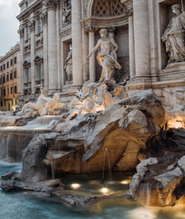 Statues at the trevi fountain wearing a surgical face masks as a symbol of the Rome lockdown caused...
