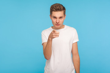 Hey, are you ready? Portrait of serious concentrated fair-haired man in casual white t-shirt...