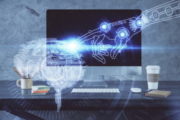Double exposure of table with computer and brain hologram. Data innovation concept.