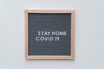 Stay Home Coronavirus Hashtag. Covid-19 warning concept banner. Flat lay felt board coronavirus...