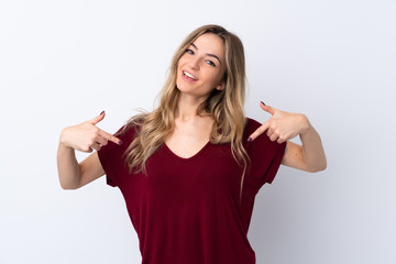 Young woman over isolated white background proud and self-satisfied