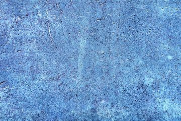 Texture of a concrete wall with cracks and scratches which can be used as a background