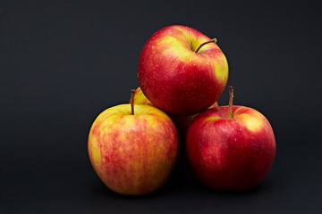 Beautiful juicy apples that have red sides and a natural look, healthy food for the human body.