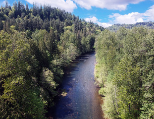 Fabulous aerial photography of Flaming Geyser State Park and the Green River on a partly cloudy summer day in Auburn Washington State