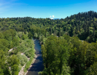 Fabulous aerial photography of Flaming Geyser State Park and the Green River on a partly cloudy summer day in Auburn Washington State