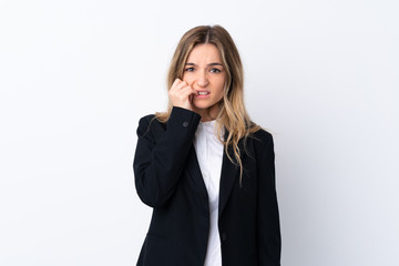 Young business woman over isolated white background nervous and scared