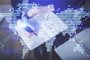 International business hologram over woman's hands taking notes background. Concept of success. Double exposure