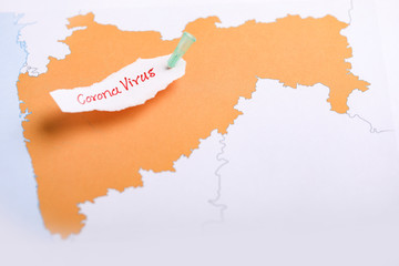 corona virus concept , Maharashtra map marked with syringe