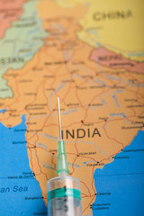 corona virus concept , Indian map marked with syringe