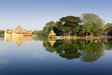 View to Karaweik royal burmese barge, a palace on the eastern shore of Kandawgyi Lake, Yangon, Myanmar - obrazy, fototapety, plakaty