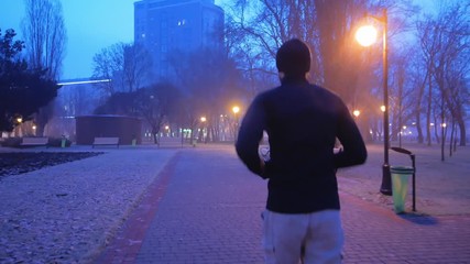 man running in the morning city