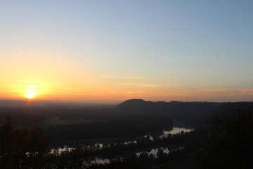 foggy sunset over river