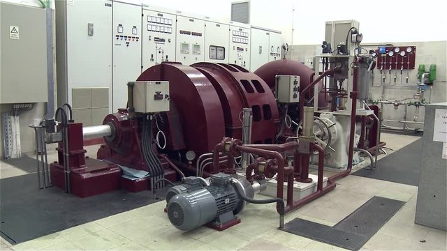 electric emgine generator inside a water hydroelectric dam	
