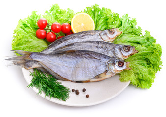 Dried roach ( Rutilus rutilus ) on a plate