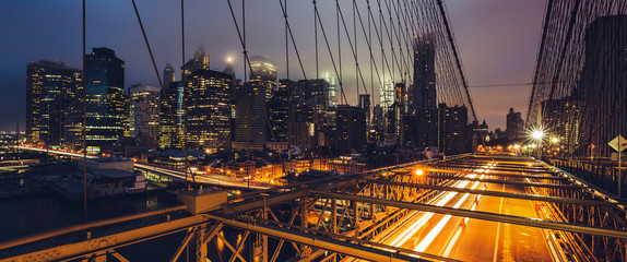 Fototapeta na wymiar Panoramic view on Brooklyn bridge by night