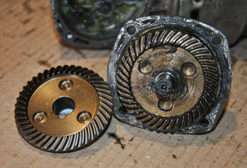 closeup of gears.  gear of a power tool on a table in a workshop