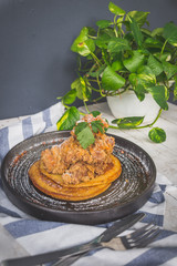 Fried chicken on house-made buttermilk pancakes served with chilli maple