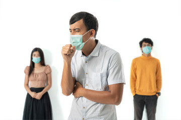 worried woman surrounded by sick people wearing face masks. social distancing concept