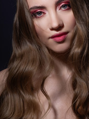 Naklejka premium Fashion portrait of a young beautiful woman with long blonde hair.