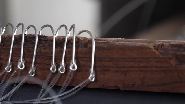 fishermen preparing fishing hooks