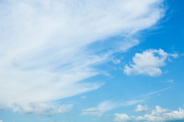 Blue sky clouds background. Beautiful landscape with clouds and orange sun on sky