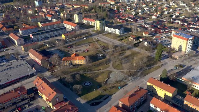 Orbiting drone footage showing an empty park in central Fagersta in Sweden. Filmed in realtime at 4K.