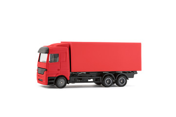 Fototapeta na wymiar Red cargo delivery truck miniature isolated on white background with clipping path