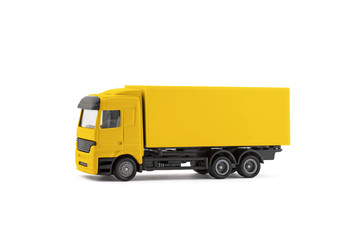 Yellow cargo delivery truck miniature isolated on white background with clipping path