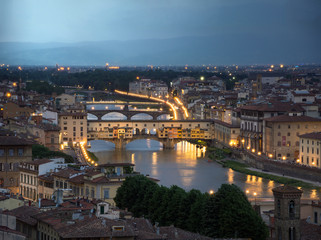 Ponte Vecchio on sunset, old bridge, medieval landmark on Arno river.