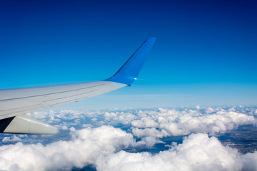 Fototapeta na wymiar Stratosphere, Plane wings and the sky atmosphere of the stratosphere