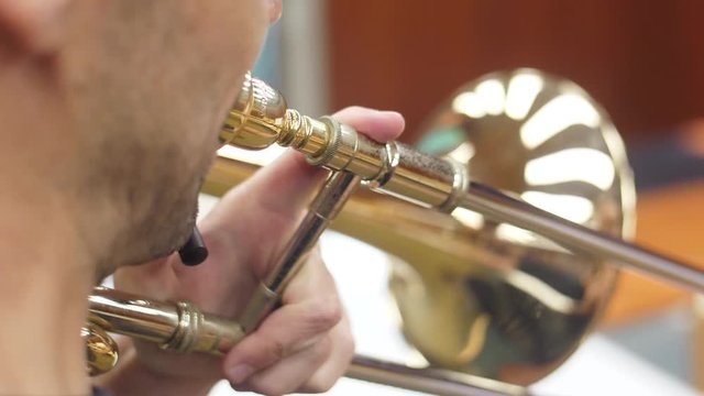 orchestra musician playing trombone