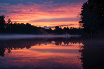 Moody sunset reflections on Mousam River - Springvale, Maine