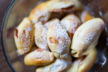 homemade sweet cakes filled with jam from rolled out yeast dough