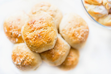 Fresh salty bread buns pastry topped with salt
