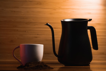 cup of coffee on wooden table